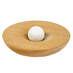 An incense stick holder made of Yellow Sandstone and White marble, with a white ball placed on top.
