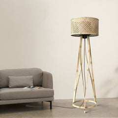 Modern Mushroom Floor Lamp with the woven basket shade in a minimalistic room.