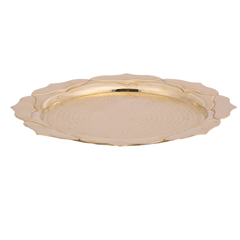 A round brass pooja thaal with a smoothened petal pattern covering its edges.