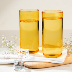 Premium Juliette Cocktail Glasses in yellow color, filled with water